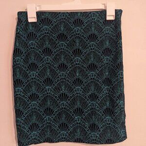 Gorgeous black and shiny teal stretch mini skirt. So pr
